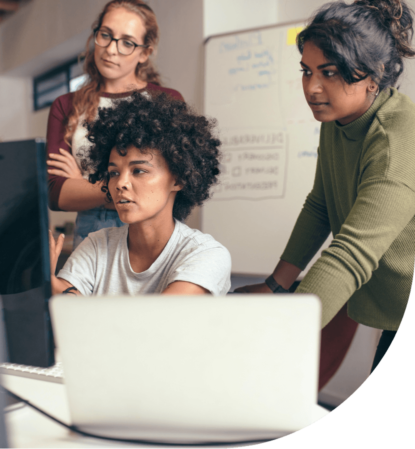 three female team members working together